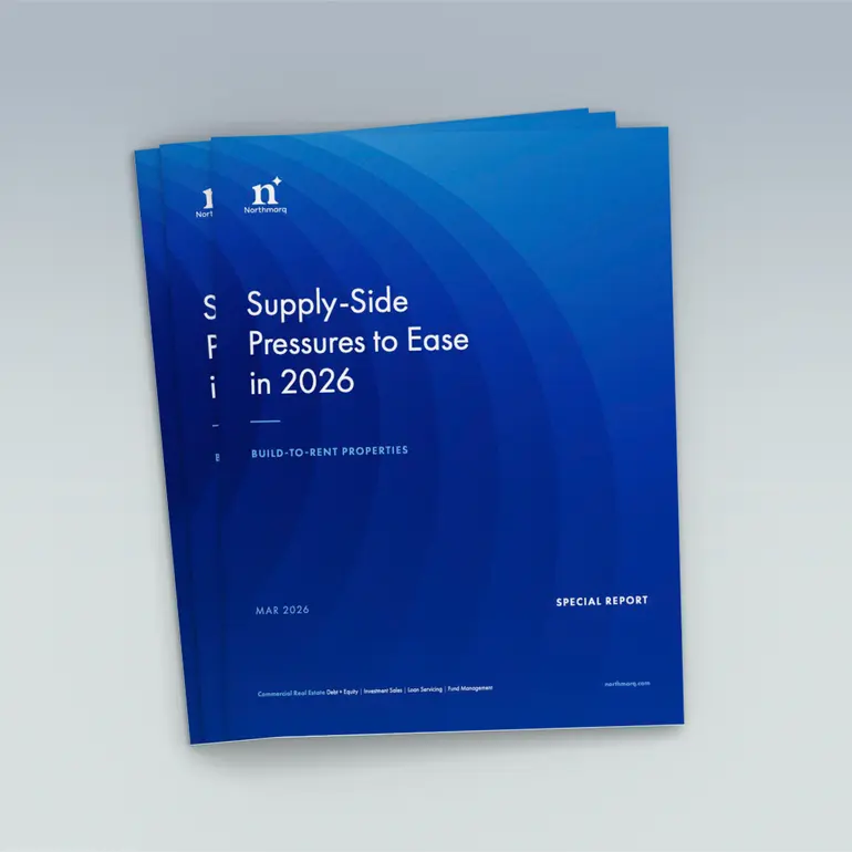 build-to-rent blue brochure with "supply-side-pressures-to-ease-in-2026" headline written on it