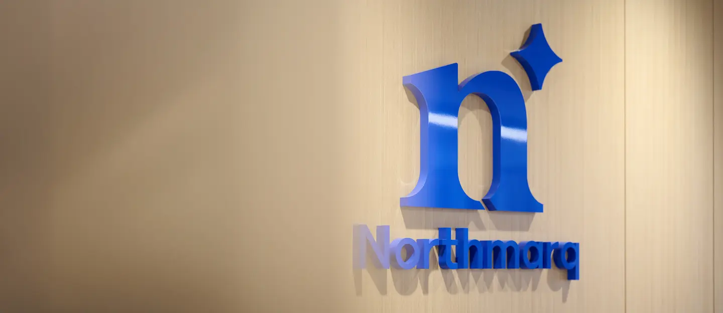 Northmarq logo sign on wall
