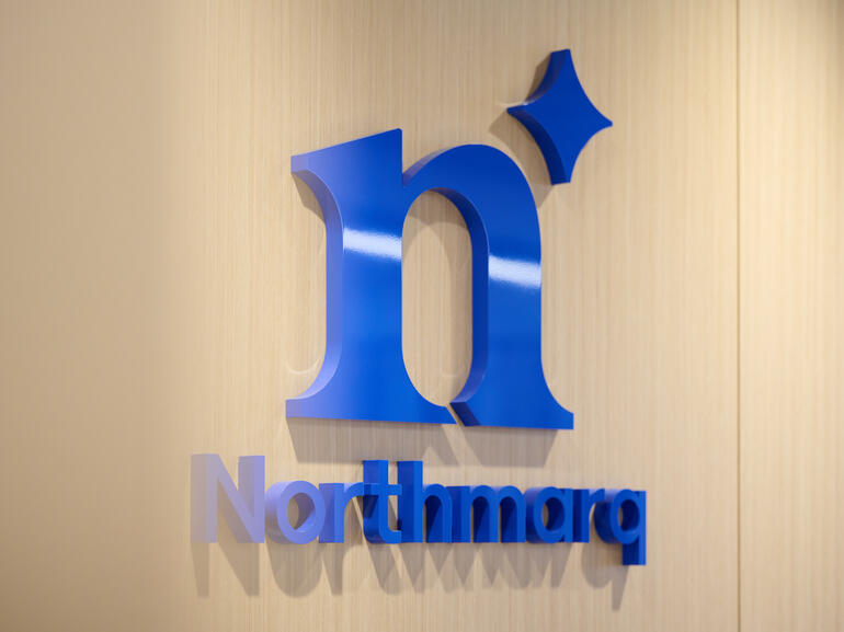 Logo of Northmarq at headquarters