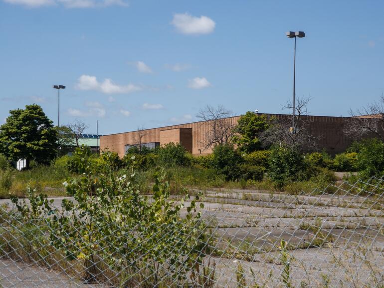 Photo of an abandoned shopping mall's department store
