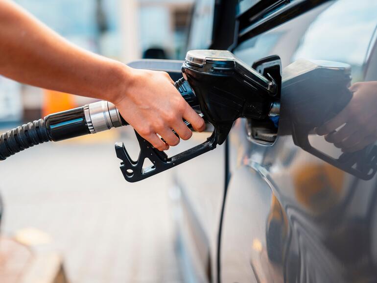 Someone putting gas in their car