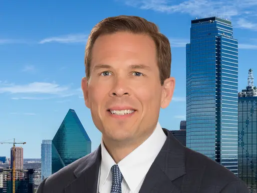 Northmarq's Jeff Erxleben in front of the Dallas, Texas skyline