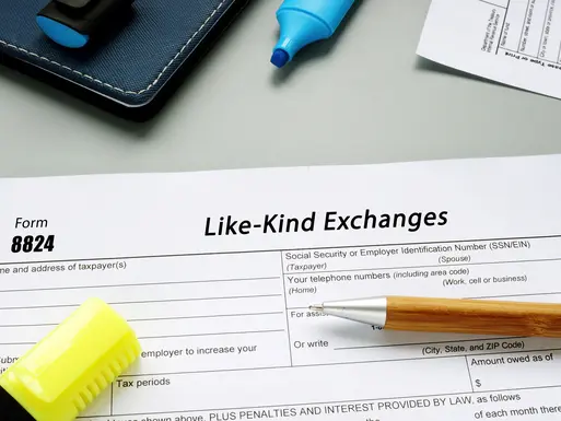 Form 8824 Like-Kind Exchanges phrase on the sheet