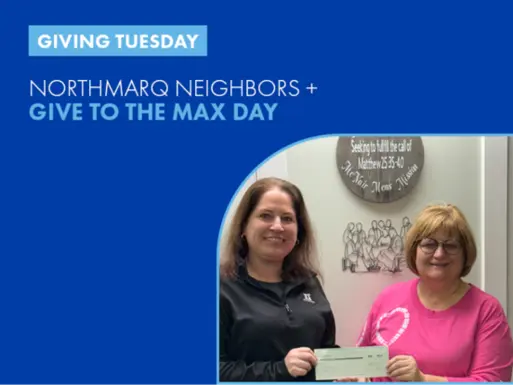 Lanie Beck hands check to charity.