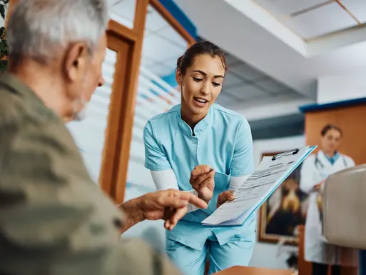 Physician explaining a medical chart to a patient