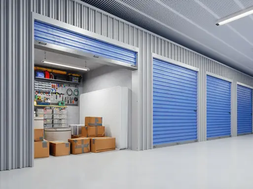 Inside a self-storage unit with boxes, tools and other items
